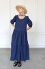 BLUE EMBROIDERED DRESS WITH RUFFLE AT THE WAISTLINE