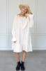 Embroidered cotton dress with details on the front