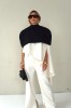SHOULDER CAPE WITH ZIPPER AT THE BACK