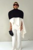 SHOULDER CAPE WITH ZIPPER AT THE BACK