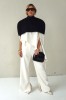SHOULDER CAPE WITH ZIPPER AT THE BACK