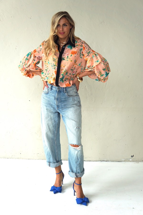 Peach floral shirt with black collar