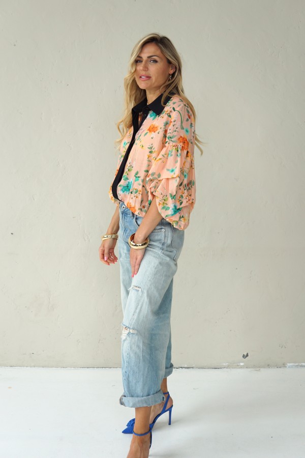 Peach floral shirt with black collar