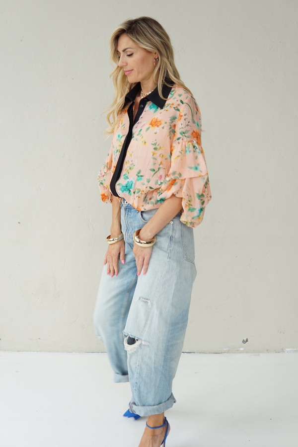 Peach floral shirt with black collar