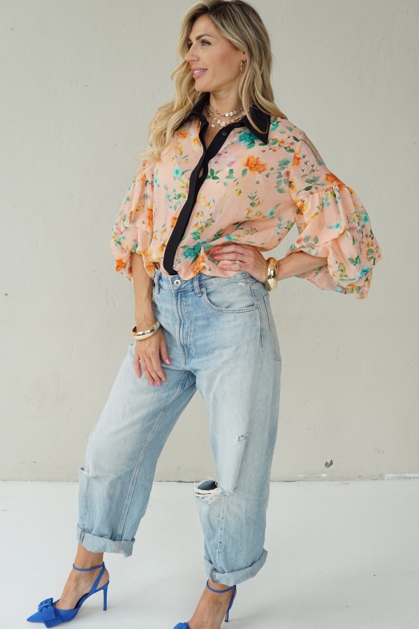 Peach floral shirt with black collar