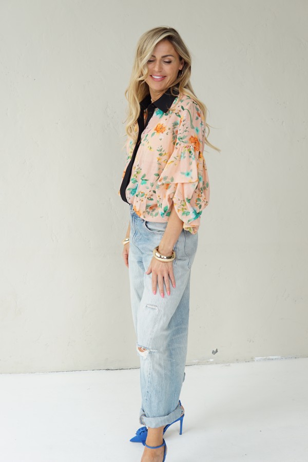 Peach floral shirt with black collar