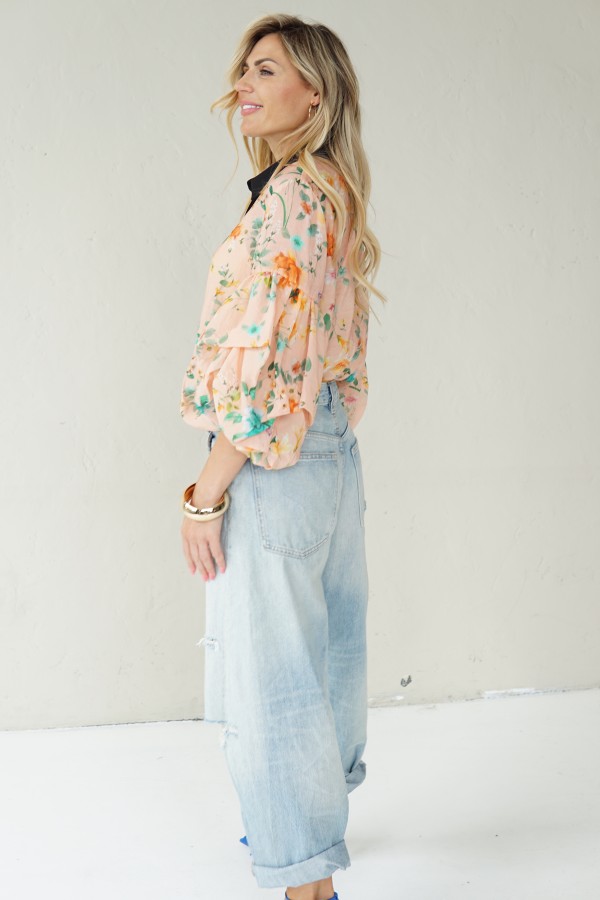 Peach floral shirt with black collar
