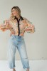 Peach floral shirt with black collar
