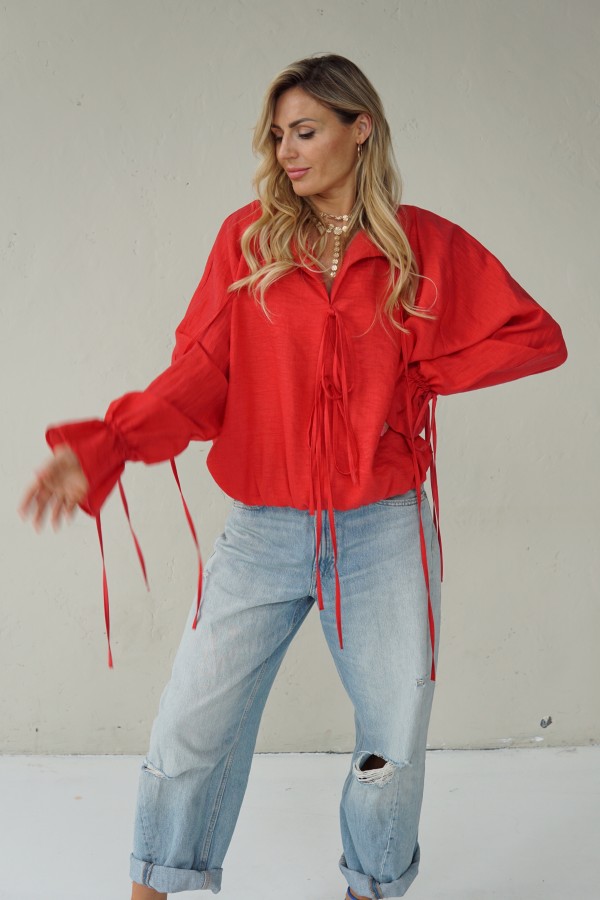 Luxurious linen blouse ties with laces