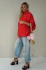 Impressive red loose-fitting shirt with pleats at the back