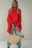 Impressive red loose-fitting shirt with pleats at the back
