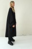 loose-fit wool dress with a ribbon
