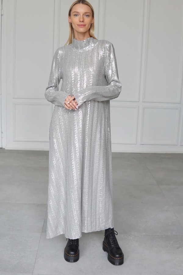 Sparkly evening dress with long sleeves.