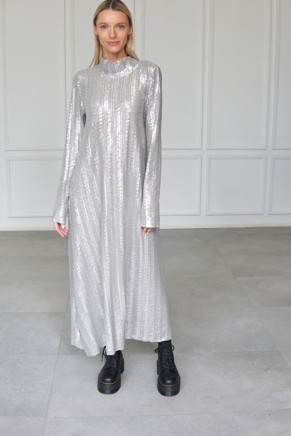 Sparkly evening dress with long sleeves.