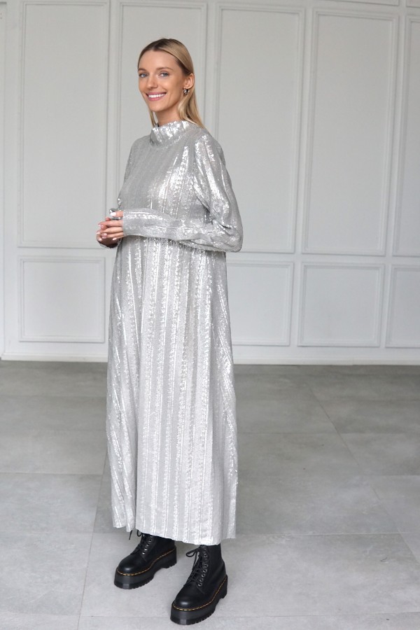 Sparkly evening dress with long sleeves.