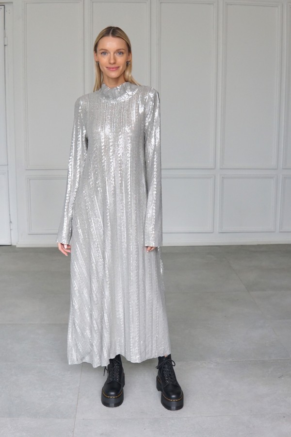 Sparkly evening dress with long sleeves.