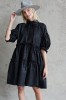 black jacquard dress with puff sleeves