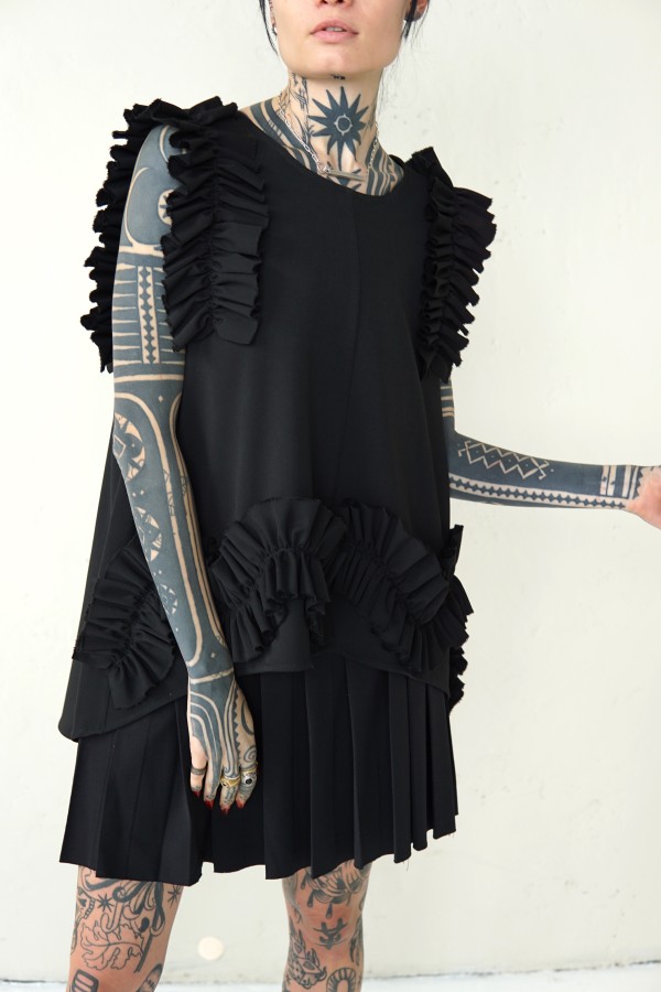 BLACK WOOL BLOUSE WITH RUFFLED DETAILS