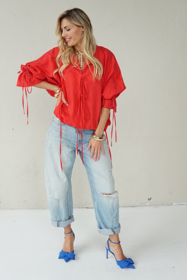 Luxurious linen blouse ties with laces
