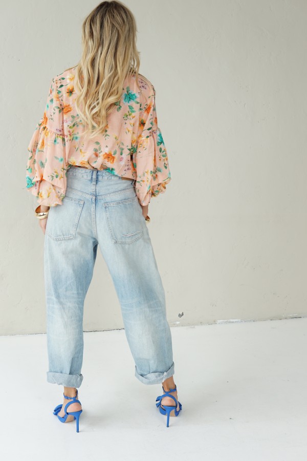 Peach floral shirt with black collar