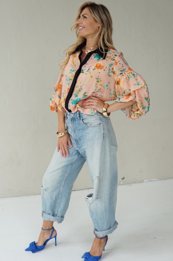 Peach floral shirt with black collar