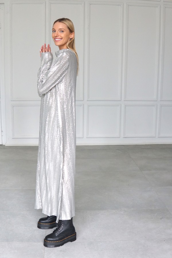 Sparkly evening dress with long sleeves.