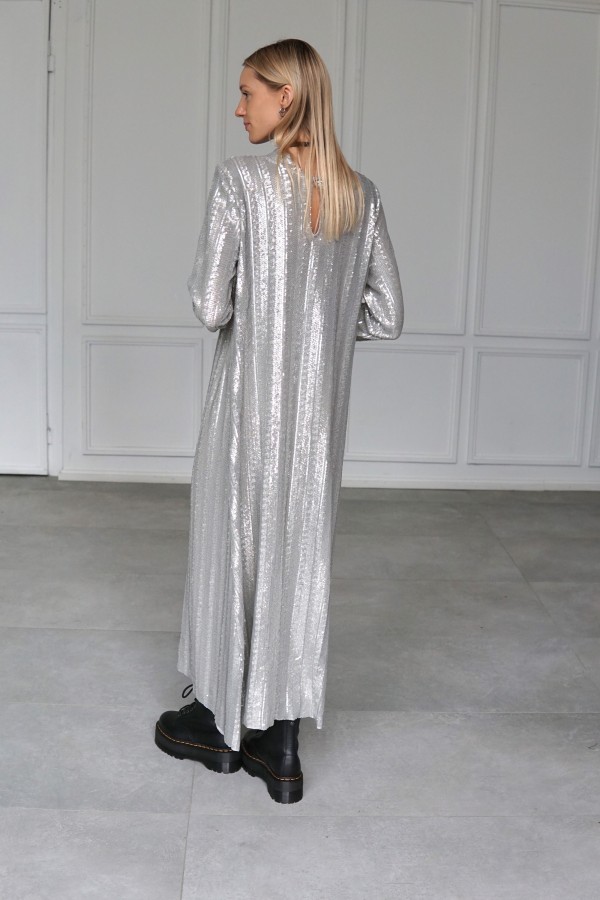 Sparkly evening dress with long sleeves.