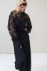 black evening lace blouse with a wide silhouette and taffeta collar and cuffs
