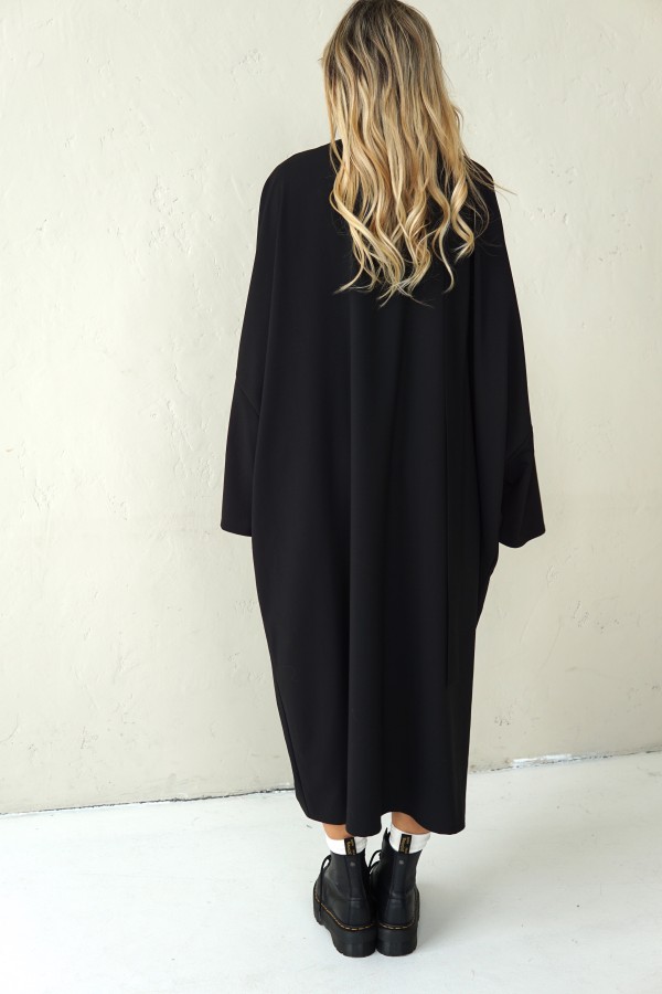 loose-fit wool dress with a ribbon